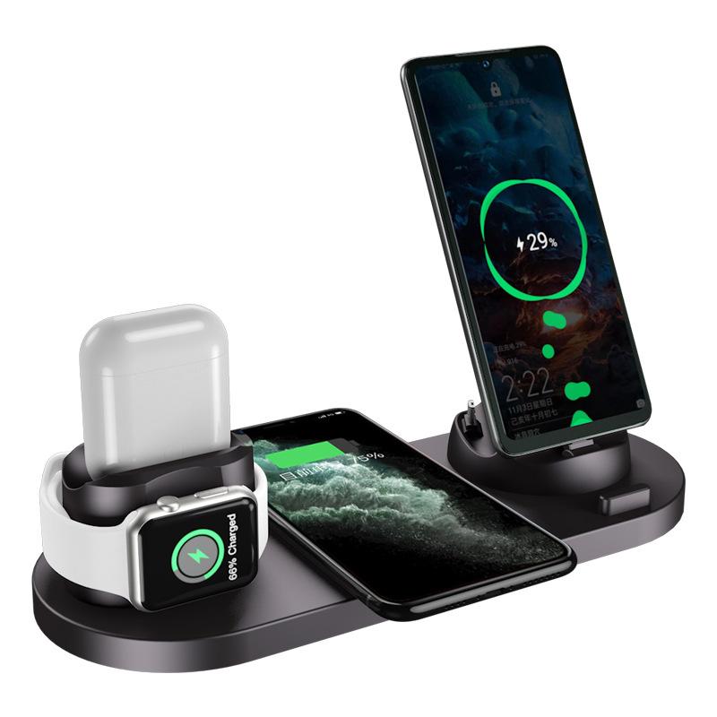 iPhone posé sur un socle de charge MagSafe, avec AirPods et Apple Watch
